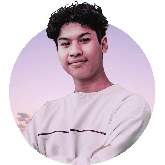 A young man with a dusk background